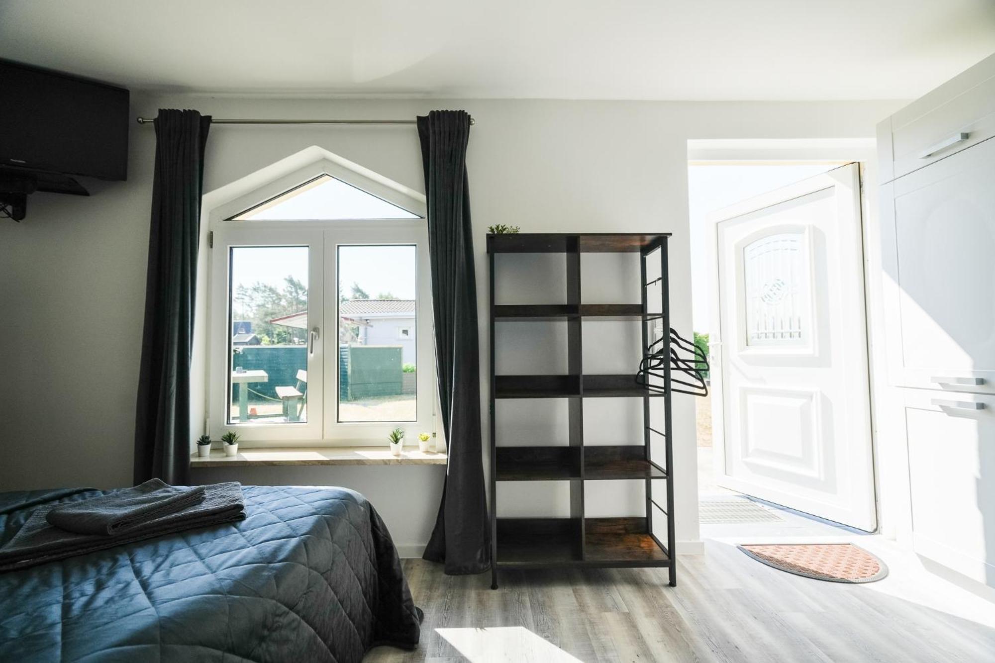 Black Tiger Seaside - Ferienwohnungen Direkt Am See Garden 部屋 写真